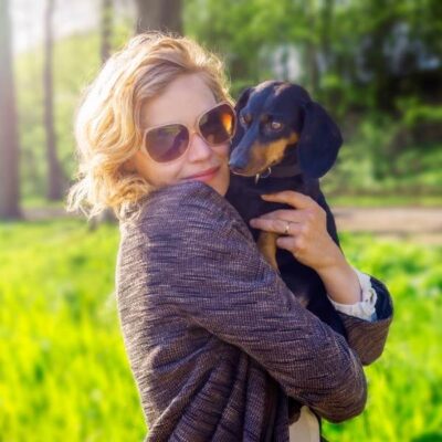 Beth Adelman - Journalist with her cute dachshund dog